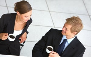 Businessteam at a meeting This is a series of business pictures with three professional Scandinavian models. The picture is taken in a downtown cafe with great light.